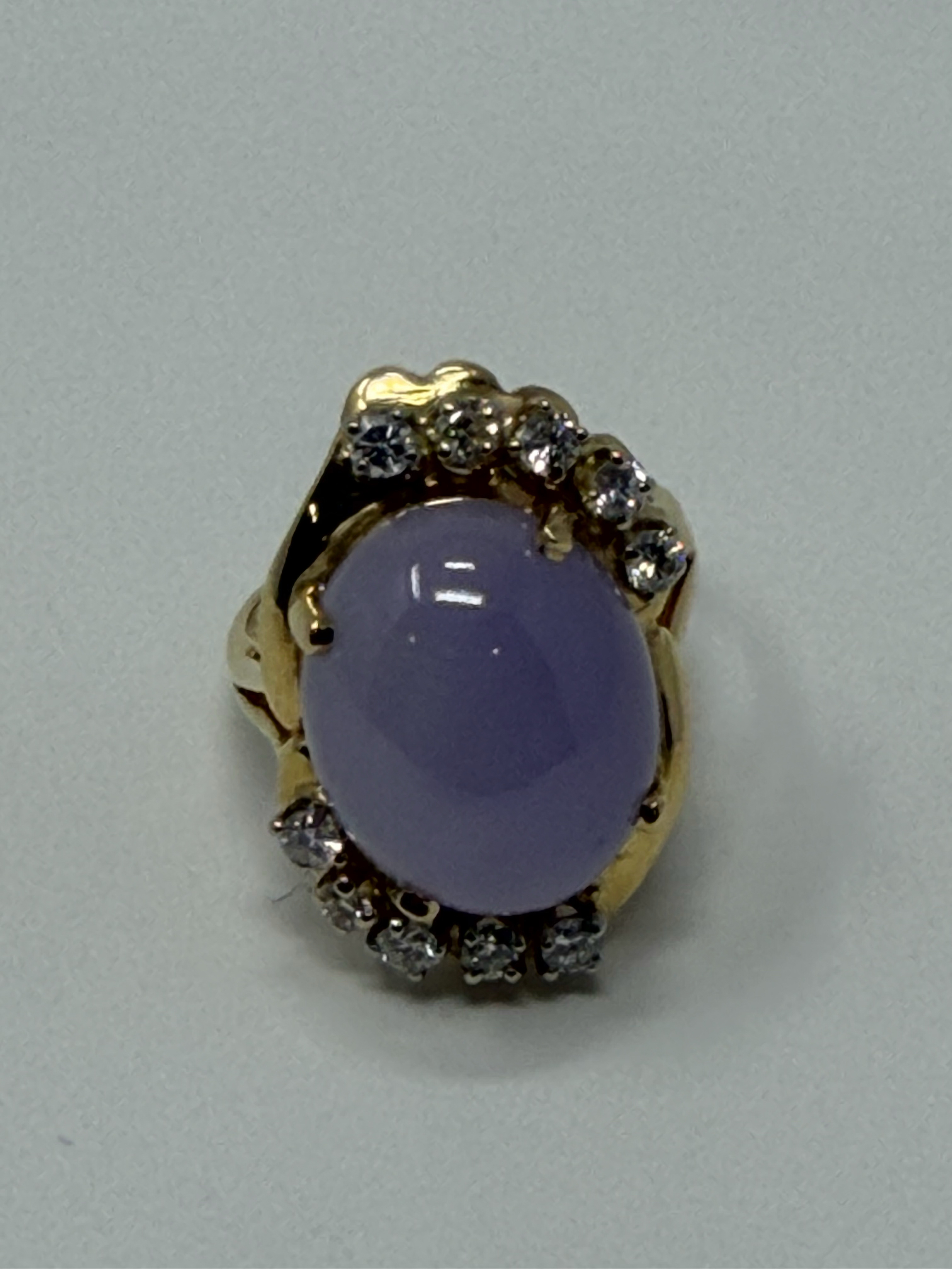 Lavender jade cabochon ring in yellow gold with diamond halo